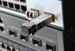 An SFP module is inserted into the switch An SFP module is inserted into the switch